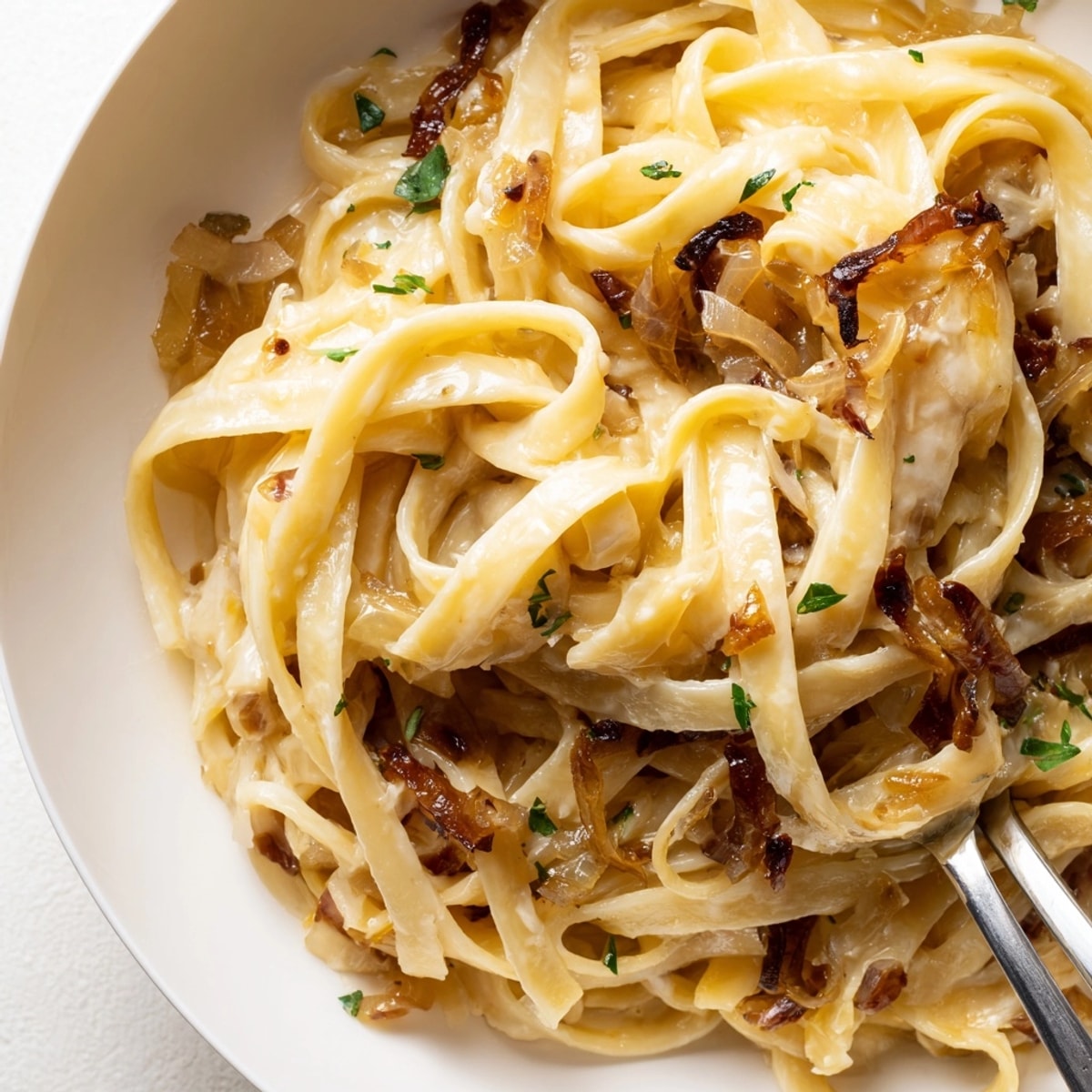 Warm, comforting One-Pot French Onion Pasta, a simplified and flavorful take on soup.