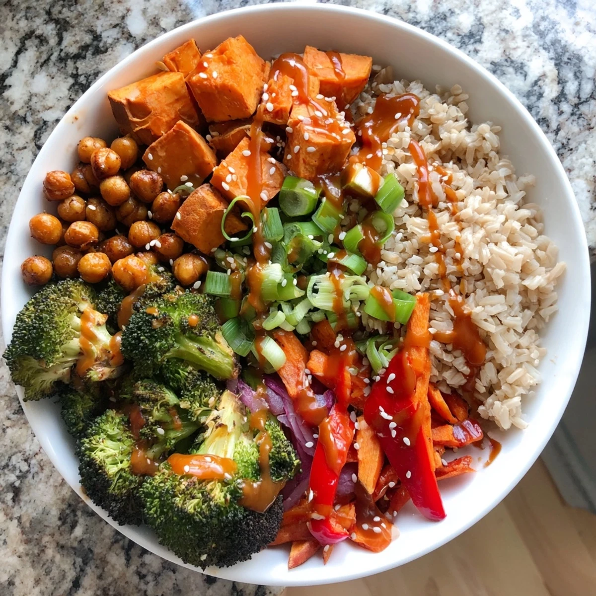 Colorful grain bowls featuring miso-butter and gochujang-maple sauces for a tasty meal.  