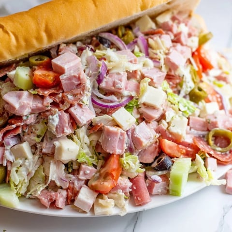 Flavor Mash-Up Sandwiches stacked high with vibrant meats, cheeses, and fresh veggies.  