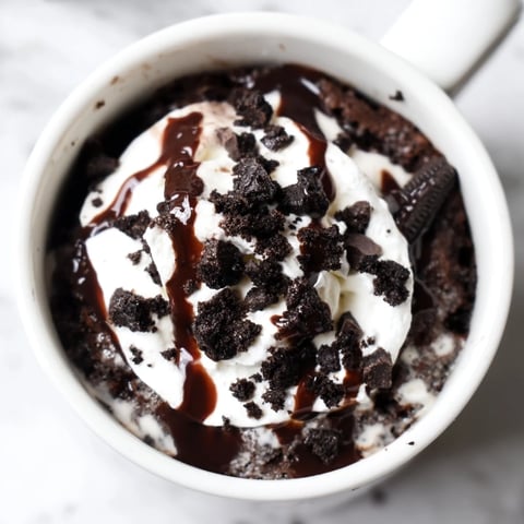 Fudgy Oreo mug cake, perfectly portioned for a quick, single-serving dessert in minutes.