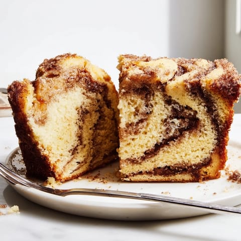 Deliciously swirled Maple Ginger Cinnamon Sugar Pancake Muffin Loaf, a sweet treat to savor.  